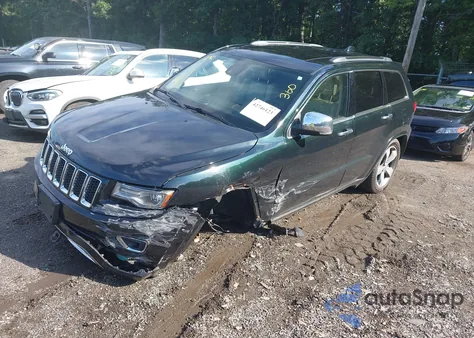 2014 Jeep Grand Cherokee Overland из США, поврежденный, VIN 1C4RJFCG1EC192437
